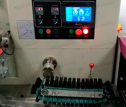 Горизонтальный упаковочный автомат MAGIKON-450AGDPT Горизонтальный упаковочный автомат MAGIKON-450AGDPT