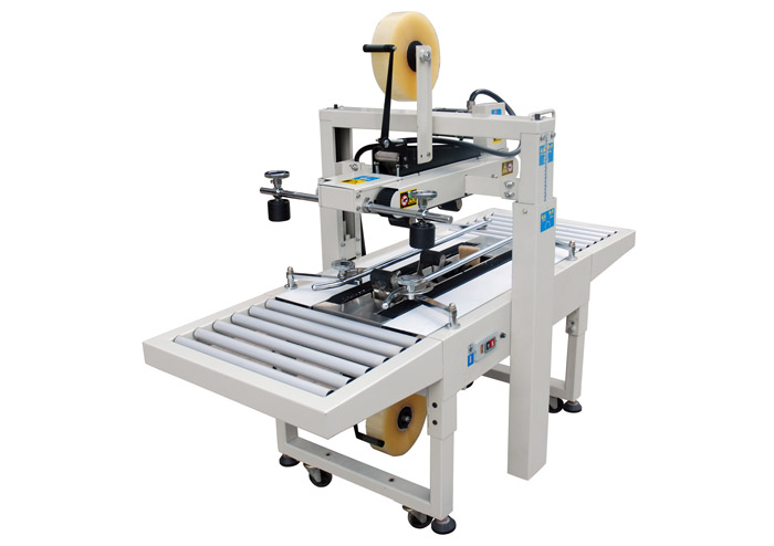 Заклейщик коробок скотчем FXJ-6050  Заклейщик коробок скотчем FXJ-6050