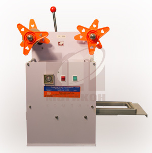 Машина для запайки пленкой лотков .  Машина для запайки пленкой лотков .