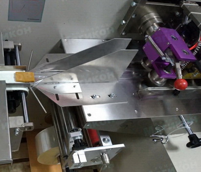 Упаковка фруктовой пастилы на MAGIKON-250AGX. Упаковка фруктовой пастилы на MAGIKON-250AGX.