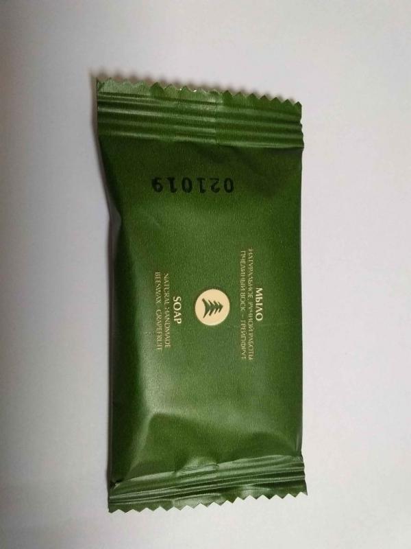 Горизонтальный упаковочный автомат MAGIKON-250AGX для упаковки мыла и другой продукции для одноразового использования.